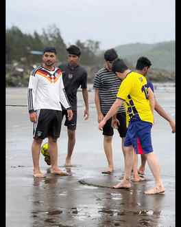 Salt in the air, sand under our feet, and football in our he
