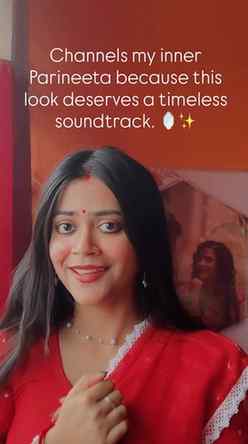 Classic Bengali saree look + Shreya Ghoshal vocals = Perfect