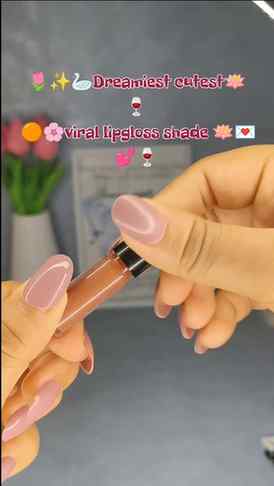 Lip gloss is a cosmetic product that adds shine and subtle c