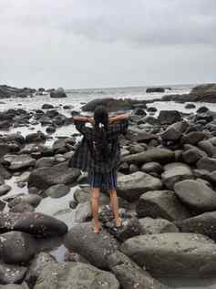 Finding my balance, somewhere between the waves and the rock
