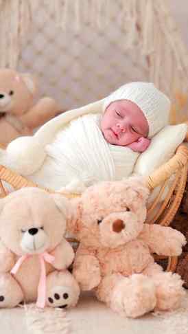 Tiny hands, sweet dreams, and a cuddly teddy by his side. 🧸
