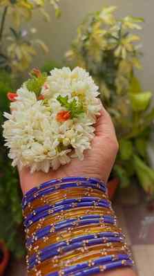 Wrapped in tradition, adorned with love, and carrying genera