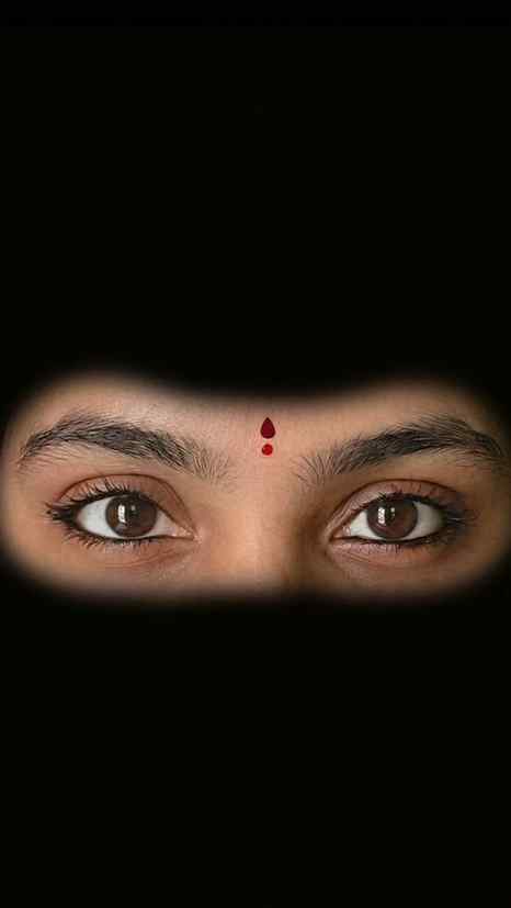 "Eyes that speak and a bindi that shines. ✨ Obsessed with th