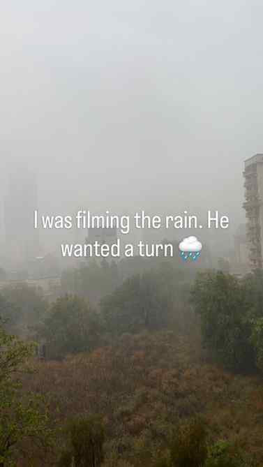 Same rain, two filmmakers 🌧️ Mom filming rain, toddler film