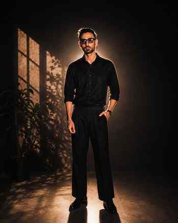 cinematic fashion, men’s editorial look, luxury black outfit