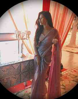 In english we say :- Like a wave flows the lavender saree, y
