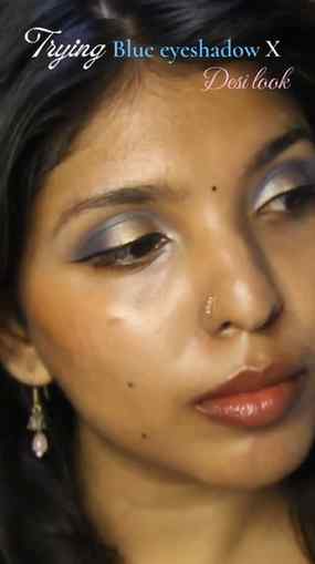 me experimenting with blue eyeshadow and actually loving it.