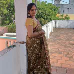 Wrapped in timeless elegance, carrying confidence in every d