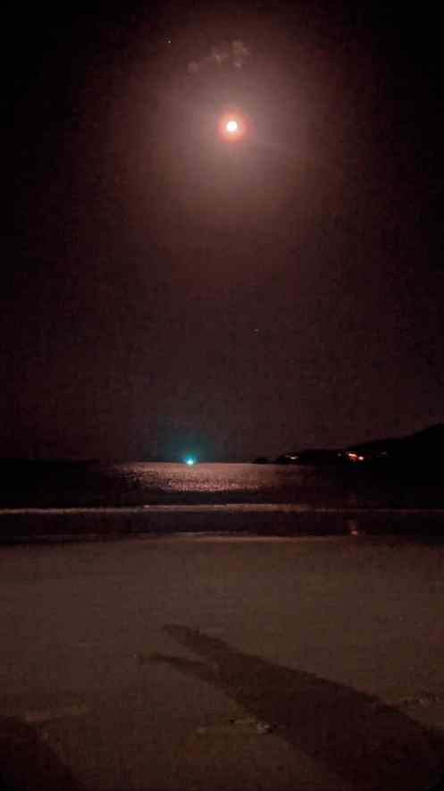 Where the moon kisses the ocean,
I found a little piece of m