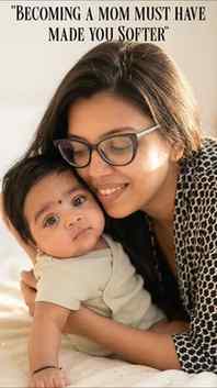 Soft with my baby. Fierce with the world. That's motherhood.
