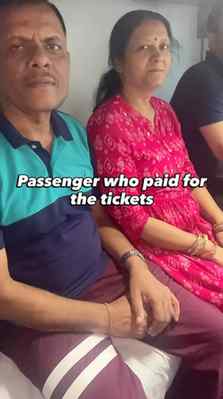 POV: The ticket holders are adjusting in one corner, while t